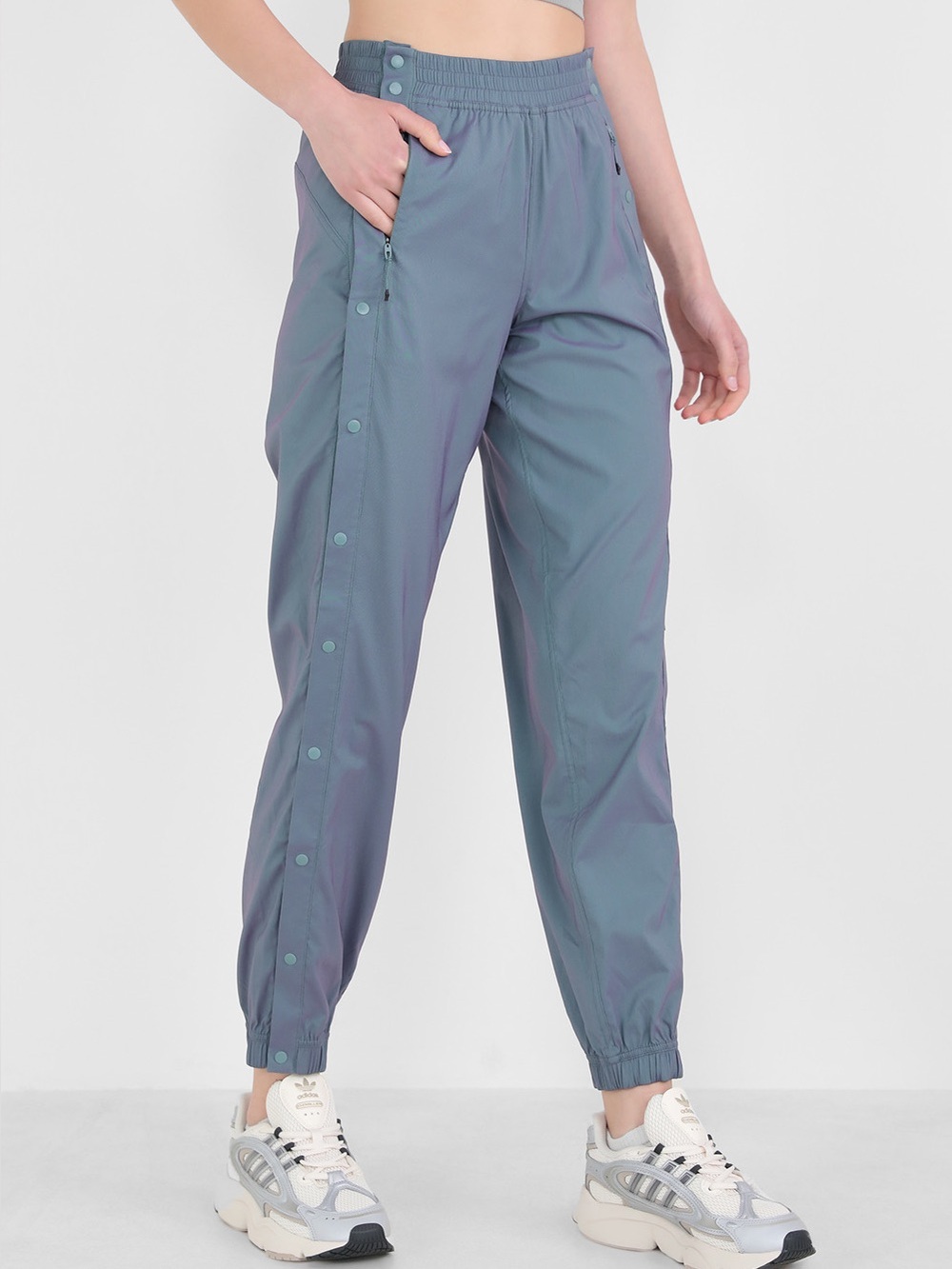 Lululemon Tear-Away Mid-Rise Track Pants in an iridescent blue grey color size 0
